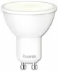 A white LED light bulb with a GU10 base. Produktbild-Vorschau