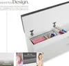 A white storage bench with its lid open, revealing storage compartments and items. Text overlays describe features. Produktbild-Vorschau