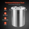 A large stainless steel pot with a lid, shown from the side, with feature callouts on the left. Voir les images du produit