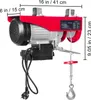 A red electric hoist with dimensions indicated by measurement lines and text. Produktbild-Vorschau