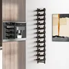A modern kitchen with built-in appliances and a wall-mounted wine rack. Náhled obrázku produktu