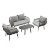 A four-piece outdoor furniture set including a sofa, two chairs, and a coffee table, arranged on a white background. Podgląd zdjęcia produktu
