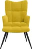 A yellow armchair with black legs on a white background. Podgląd zdjęcia produktu