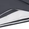 A close-up view of a folded duvet or comforter with a dark gray outer cover and a white inner filling, showing the texture and layers. Produktbild-Vorschau