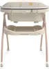 A baby bath and changing table combo on a stand. Produktbild-Vorschau