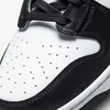 A close-up view of the toe box and laces of a Nike Dunk High sneaker. Náhled obrázku produktu