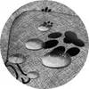 A close-up view of a gray fabric surface with water droplets and paw print patterns. Voir les images du produit