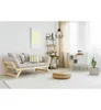 A modern living room with a sofa, shelf, and cabinet. Produktbild-Vorschau