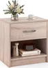 A close-up studio shot of a wooden nightstand with a drawer and an open shelf. Podgląd zdjęcia produktu