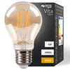A close-up of a decorative LED filament light bulb with its packaging in the background. Náhled obrázku produktu