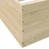 Close-up of the corner of a light-colored wooden bed frame. Produktbild-Vorschau