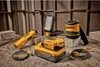 DeWalt tools and accessories arranged on a wooden surface with a wooden plank background. Podgląd zdjęcia produktu