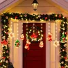 A decorated doorway with Christmas lights and ornaments. Produktbild-Vorschau