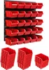 A wall-mounted storage system with multiple red bins, and stacks of red bins in the foreground. Náhled obrázku produktu