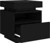 A black nightstand with one drawer partially open and a shelf above it, shown from a three-quarter angle against a white background. Náhled obrázku produktu