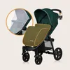 A green LIONELO Annet Buggy with accessories, presented against a light gray background. A close-up inset shows a mosquito net on the stroller seat. Náhled obrázku produktu