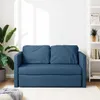 A blue sofa bed is shown in a well-lit room with a plant and a bookshelf. Produktbild-Vorschau