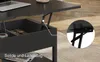 A black lift-top coffee table with its top partially raised, revealing storage space inside. A close-up inset shows the lifting mechanism. Produktbild-Vorschau