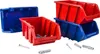 A collection of red and blue storage bins with screws and wall anchors scattered around them. Náhľad obrázku produktu