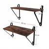 Two wooden shelves with black metal brackets are shown against a white background. Dimensions are indicated with text and lines. Produktbild-Vorschau