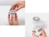 A collage showing a person holding a smoke detector and a smoke detector mounted on a wall. Produktbild-Vorschau