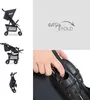 Collage of images showing a black and gray stroller in different positions, including folded, and a close-up of a folding mechanism. Anteprima dell’immagine prodotto