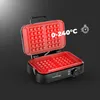 An open waffle maker with red heating plates, showing the waffle grid pattern. The appliance is black with a silver handle. A temperature range and a timer icon are overlaid on the image. Produktbild-Vorschau