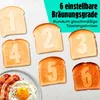 Six slices of toast, each with a number from 1 to 6 imprinted on it, are arranged to demonstrate different toasting levels. A plate with bacon and a fried egg is visible in the lower left corner. Text in the upper right corner describes the product's featu Anteprima dell’immagine prodotto