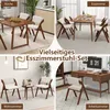 A collage of four scenes showing dining chairs in different settings: a kitchen, a dining room, a living room, and a home office. Voir les images du produit
