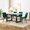 A dining set with a rectangular table and four chairs in a room with a window and artwork. Produktbild-Vorschau