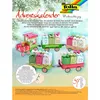 A Christmas advent calendar kit shaped like a train with gift boxes on its carriages. Anteprima dell’immagine prodotto