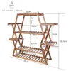 A diagram showing the dimensions of a wooden plant stand. Anteprima dell’immagine prodotto