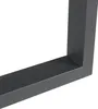 A close-up view of a dark gray metal table leg. Produktbild-Vorschau
