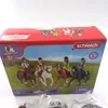 A box of Schleich Horse Club toys featuring several figurines of girls riding horses in a grassy field. Náhľad obrázku produktu