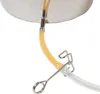 A close-up view of a beverage dispenser's tap mechanism with a yellow liquid flowing through a tube. Produktbild-Vorschau