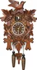 A traditional wooden cuckoo clock with carved leaves and pinecone weights. Voir les images du produit
