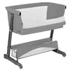A grey and white baby bassinet with a storage shelf underneath, shown on a white background. Anteprima dell’immagine prodotto