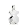 A silver-colored perfume bottle shaped like a teddy bear, presented on a white background. Náhľad obrázku produktu