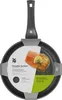 A frying pan with a piece of salmon on a piece of packaging. Produktbild-Vorschau