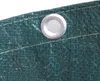 A close-up view of a green tarp with a metal grommet. Produktbild-Vorschau