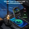 A car's interior with a phone charging wirelessly and a Bluetooth FM transmitter plugged into a car charger. Produktbild-Vorschau