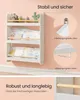 A white three-tiered bookshelf filled with children's books and toys, mounted on a light pink wall. The image also includes diagrams illustrating how to mount the shelf. Produktbild-Vorschau