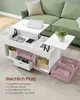 A white lift-top coffee table with storage compartments, shown in a living room setting next to a green couch. Produktbild-Vorschau