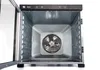 Interior view of an open appliance with a fan and mesh screen. Podgląd zdjęcia produktu