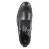 A top-down view of a black boot. Voir les images du produit
