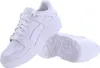 A pair of white Puma sneakers shown from a side angle against a white background. Produktbild-Vorschau