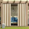 Outdoor curtains hanging on a pergola, framing a seating area with a sofa. Náhled obrázku produktu