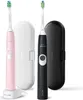 Two Philips Sonicare electric toothbrushes, one pink and one black, are displayed with their charging cases. Voir les images du produit