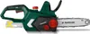 A cordless chainsaw is shown against a white background. A yellow 'X' symbol is overlaid on the battery area, indicating it is not included. Produktbild-Vorschau