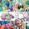A collage of several images featuring various painted rocks with different designs. Náhľad obrázku produktu